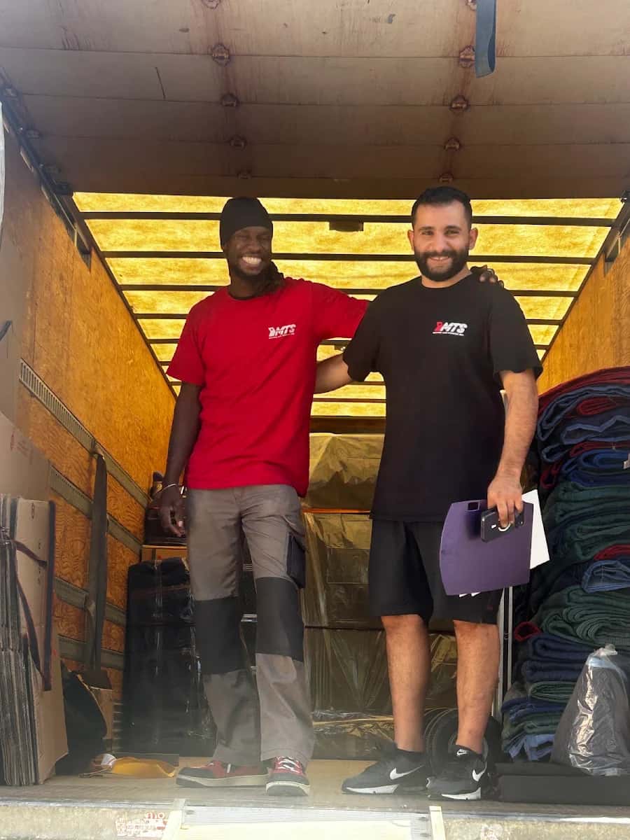Professional movers with truck equipment