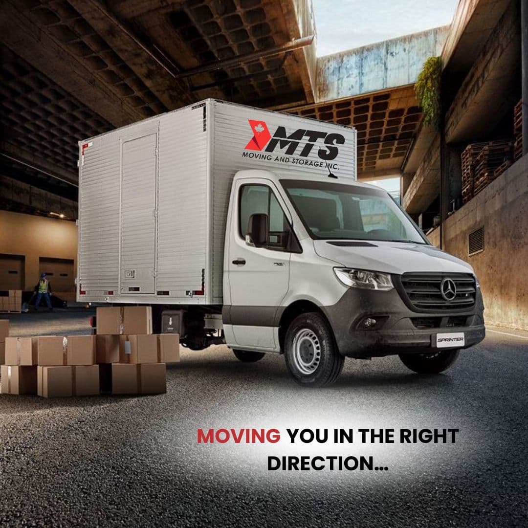 An MTS Moving truck parked inside a warehouse