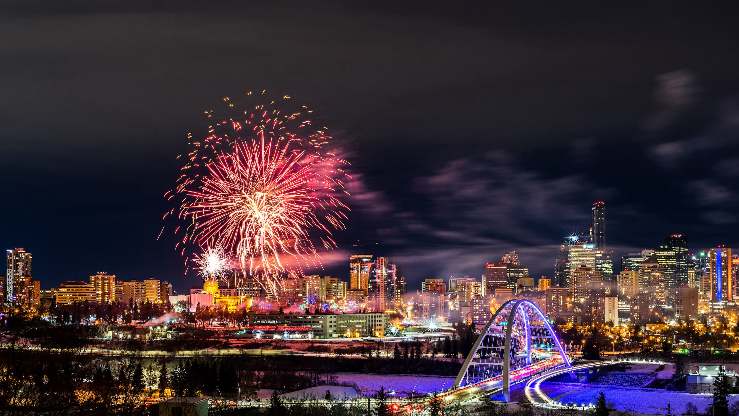 Fireworks over the Edmonton skyline at night